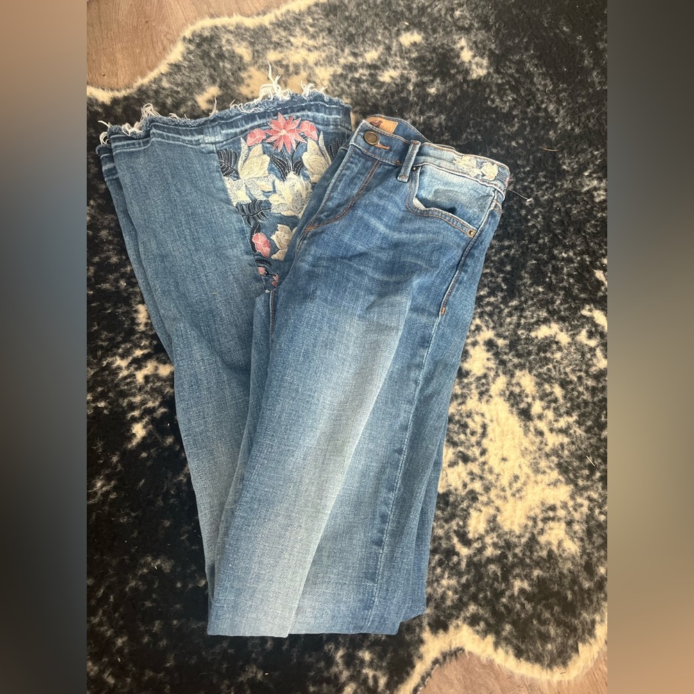 Two pairs of driftwood jeans